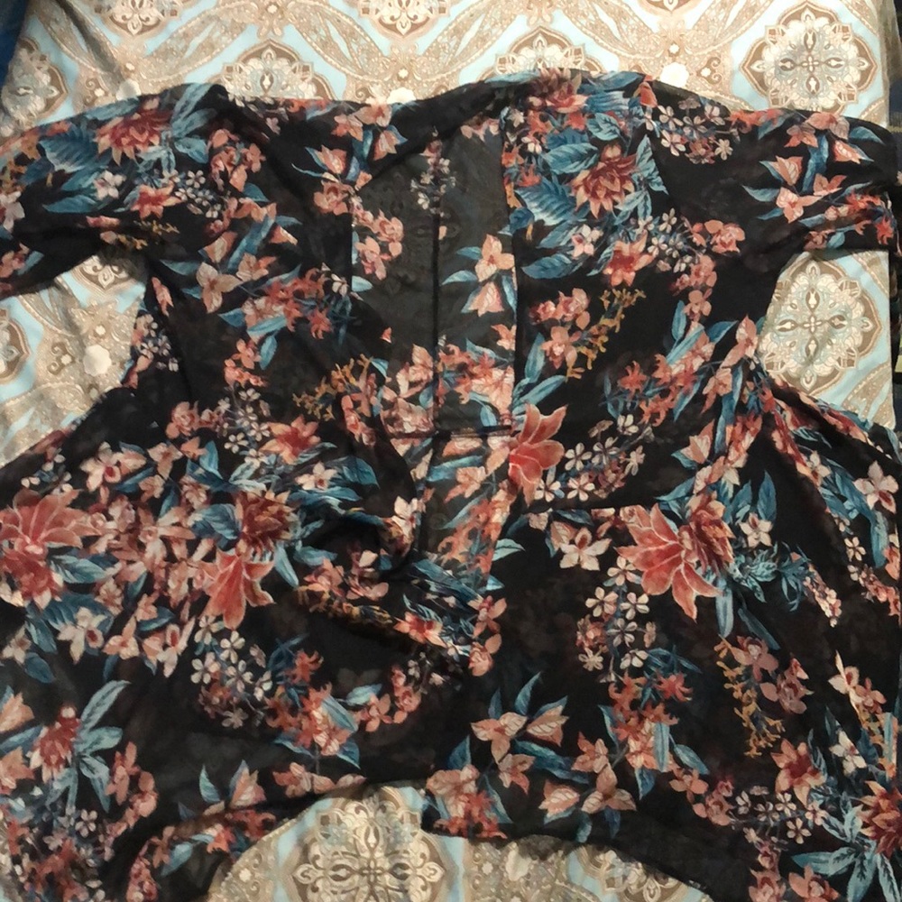 A sheer long sleeve cardigan